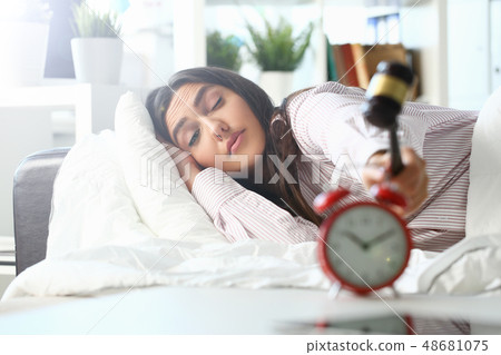 Sleepy young woman portrait with one Sleepy young woman portrait with one 48681075