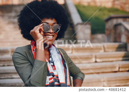 African girl in a summer city 48681412