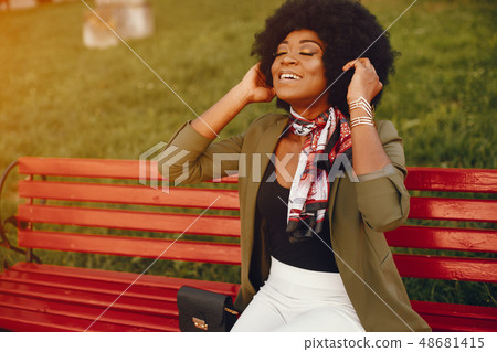 African girl in a summer city 48681415