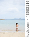 Swimming in the sea 48683116