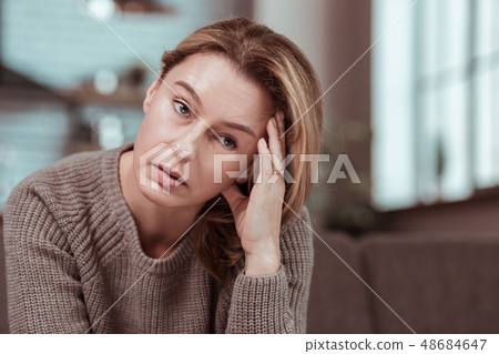 Wife having strong headache after big fight with husband Wife having strong headache after big fight with husband 48684647