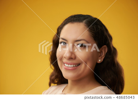 Latina girl smiling headshot Latina girl smiling headshot 48685043