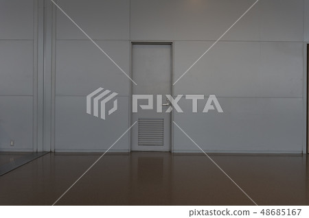 sidewalk by street wall & door sidewalk by street wall & door 48685167