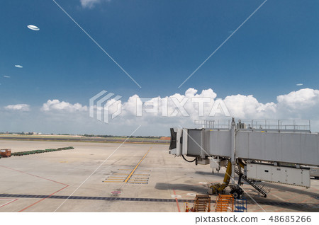 Passenger boarding bridge waiting for a commercial 48685266