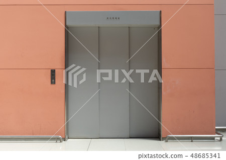 sidewalk by street wall & door sidewalk by street wall & door 48685341