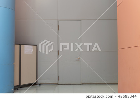 sidewalk by street wall & door sidewalk by street wall & door 48685344