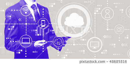 Cloud computing with businessman holding a tablet Cloud computing with businessman holding a tablet 48685816
