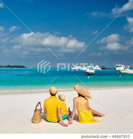 Family with three year old boy on beach 48687933