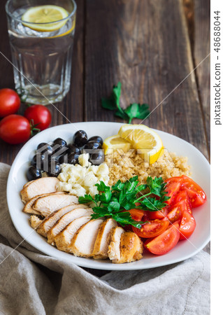 Mediterranean chicken quinoa bowl Mediterranean chicken quinoa bowl 48688044