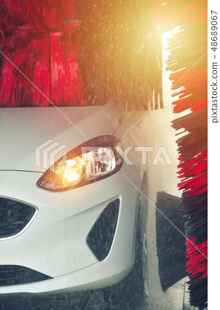 Automatic car wash in action. Car wash concept. Automatic car wash in action. Car wash concept. 48689067