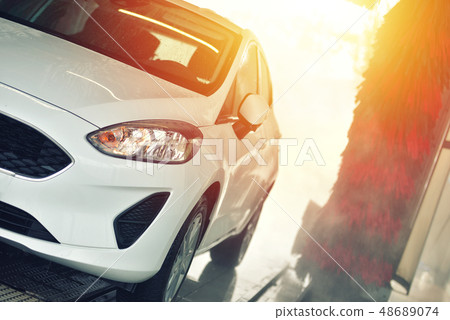 Automatic car wash in action. Car wash concept. Automatic car wash in action. Car wash concept. 48689074