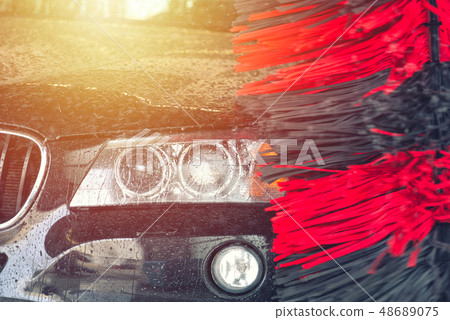Automatic car wash in action. Car wash concept. 48689075