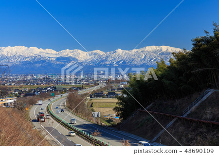 Toyama _ Tateyama mountain range and Hokuriku Expressway Toyama _ Tateyama mountain range and Hokuriku Expressway 48690109
