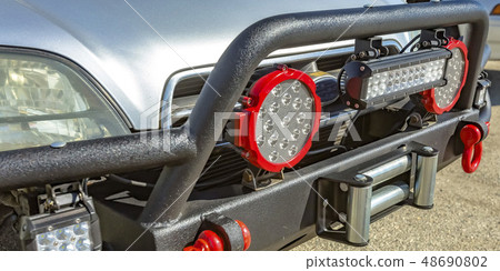 SUV with spotlights and tow hook on grille guard SUV with spotlights and tow hook on grille guard 48690802