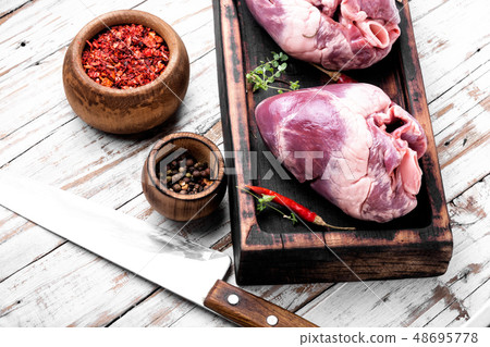 Raw pork heart 48695778