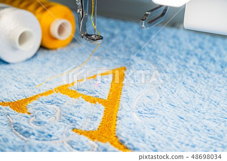 Alphabet design in hoop of embroidery machine Alphabet design in hoop of embroidery machine 48698034