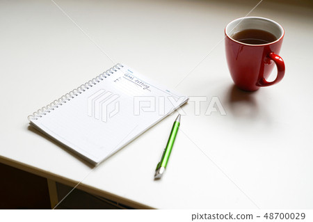 Goals setting to be written on a notebook with a Goals setting to be written on a notebook with a 48700029