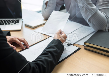 Employer boss sending a remuneration letter to businessman in or 48700862