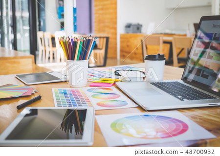 Graphic designer object tool and color swatch samples at workspa 48700932