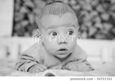 portrait of a little boy: baby's face close-up 48701502