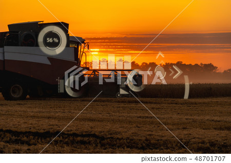 A modern combine harvester A modern combine harvester 48701707