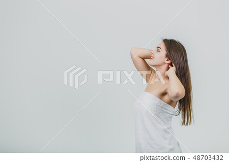 Beautiful girl model with shiny black and straight long hair. Straighten keratin. Treatment, care Beautiful girl model with shiny black and straight long hair. Straighten keratin. Treatment, care 48703432