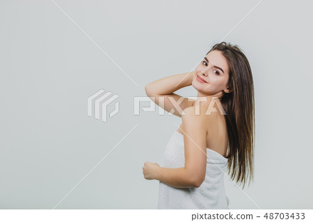 Beautiful girl model with shiny black and straight long hair. Straighten keratin. Treatment, care Beautiful girl model with shiny black and straight long hair. Straighten keratin. Treatment, care 48703433