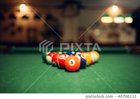 Billiard balls on green table, american pool Billiard balls on green table, american pool 48706111