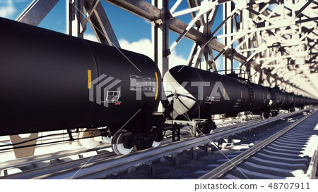 Rail tank cars with oil on the rails at sunrise. Train transportation of tankers. The container of Rail tank cars with oil on the rails at sunrise. Train transportation of tankers. The container of 48707911