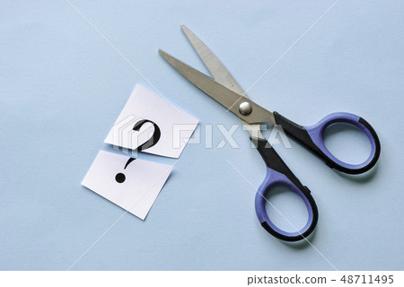 Question mark on a white card cut through Question mark on a white card cut through 48711495