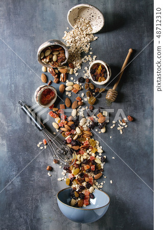 Variety of dried fruits and nuts Variety of dried fruits and nuts 48712310