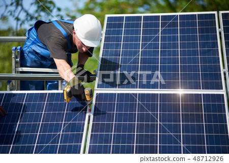 Stand-alone exterior solar panel system installation, renewable green energy generation concept. 48712926