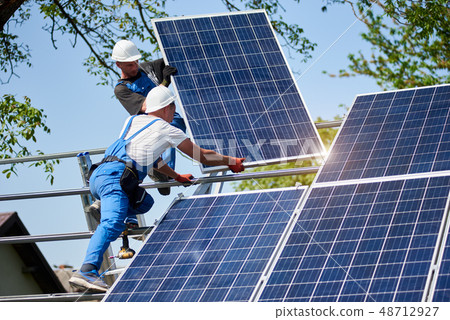 Stand-alone exterior solar panel system installation, renewable green energy generation concept. 48712927