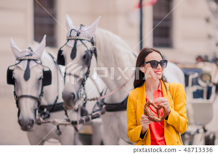 Tourist girl enjoying her european vacation in Vienna 48713336