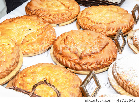Fresh delicious sweet cakes ready for sale Fresh delicious sweet cakes ready for sale 48713642