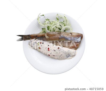 Portion of salted herring fish filets with onions Portion of salted herring fish filets with onions 48715059