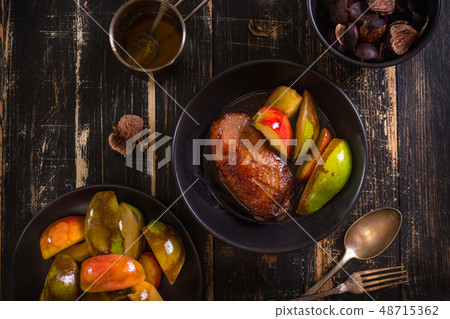 Roasted duck breast with golden crispy skin Roasted duck breast with golden crispy skin 48715362