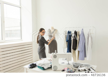 Dressmaker, fashion designer, tailor and people concept - designer dressed in stylish outfit 48716136