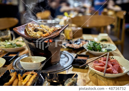 Traditional vietnamese hot spot restaurant with varied food 48716732