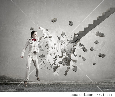 Man breaking ladder Man breaking ladder 48719244