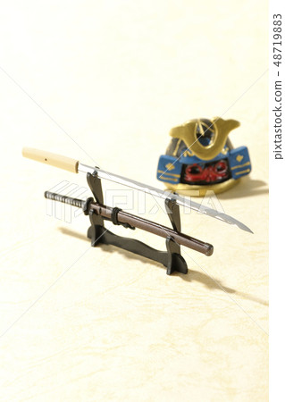 Blue helmet and Japanese sword Blue helmet and Japanese sword 48719883