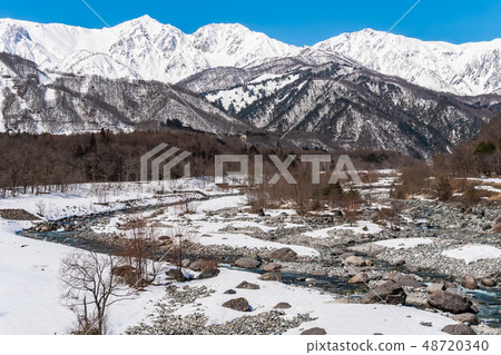 Snow mountain in Hakuba village and snowy landscape in blue sky 48720340