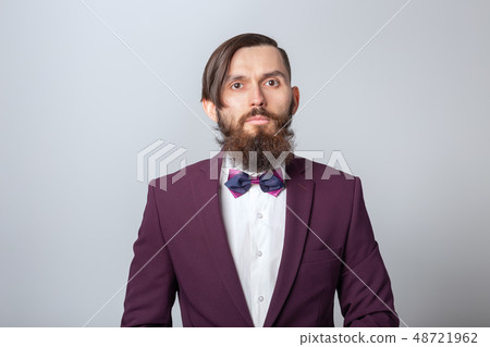 people, fashion and style concept - close-up portrait of young stylish male hipster on grey people, fashion and style concept - close-up portrait of young stylish male hipster on grey 48721962