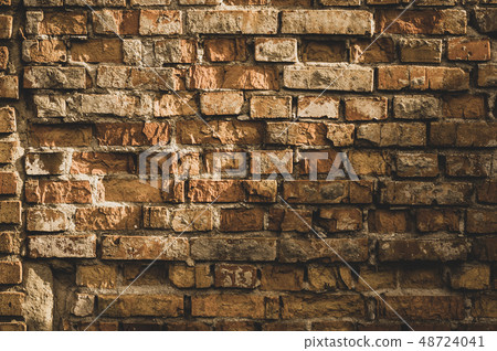 brickwork of old red brick with shabby plaster 48724041