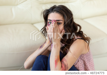 Victim, abuse and domestic violence - Woman crying, suffering domestic violence Victim, abuse and domestic violence - Woman crying, suffering domestic violence 48724773
