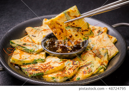 Chijimi Korean gourmet Korean Okonomiyaki jijim and iron pan Korean foo Chijimi Korean gourmet Korean Okonomiyaki jijim and iron pan Korean foo 48724795
