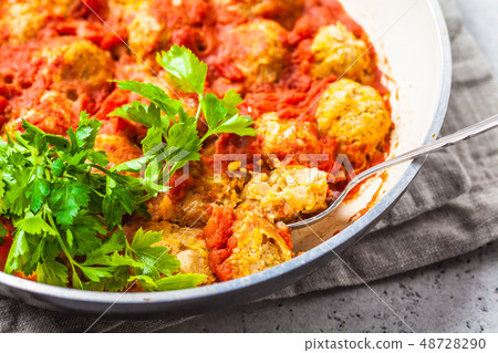 Baked vegan bean meatballs in tomato sauce Baked vegan bean meatballs in tomato sauce 48728290