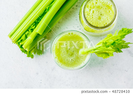 Green detox celery juice in a glass. 48728410