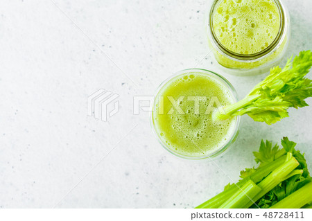 Green detox celery juice in a glass. 48728411