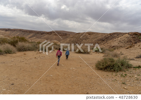 Child in hiking trek of Israeli desert Child in hiking trek of Israeli desert 48728630